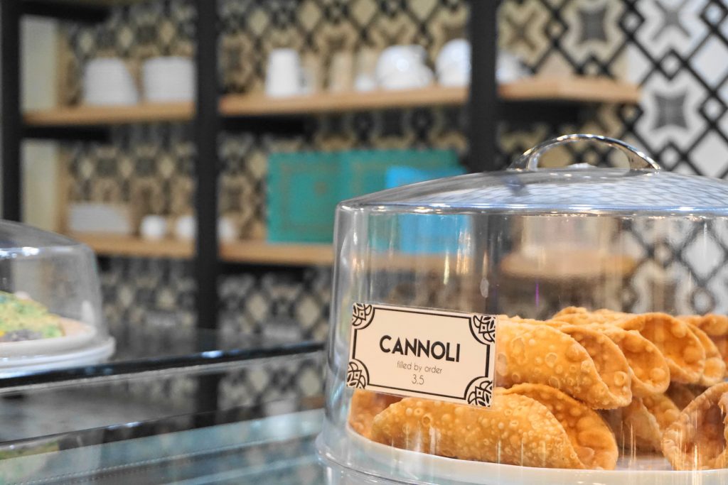 cannoli in glass case