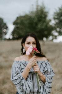 Lucy Brummett holding flowers